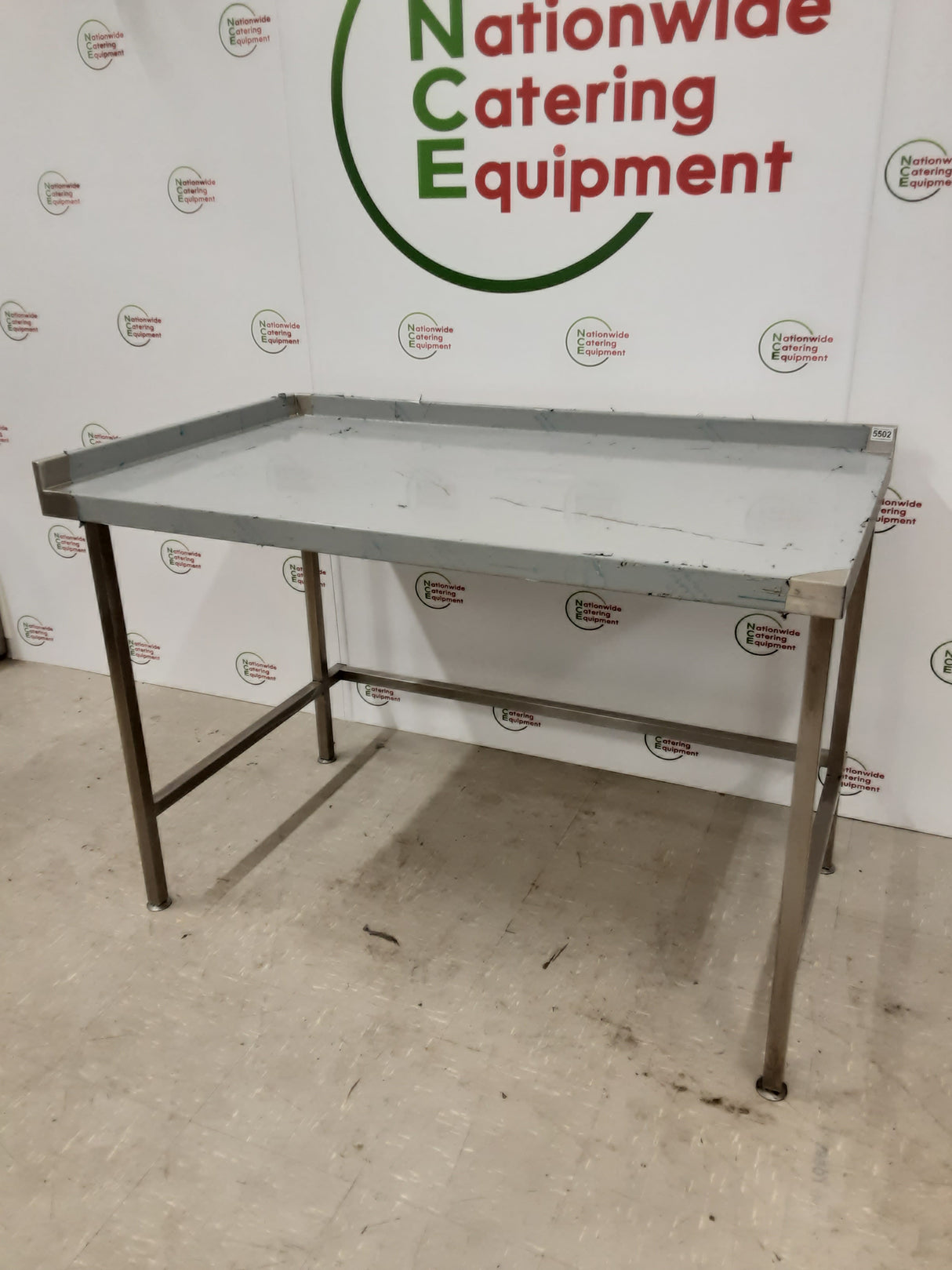 New/Un-Used Stainless Steel Table With Appliance Space 137x80cm (NCE5502)