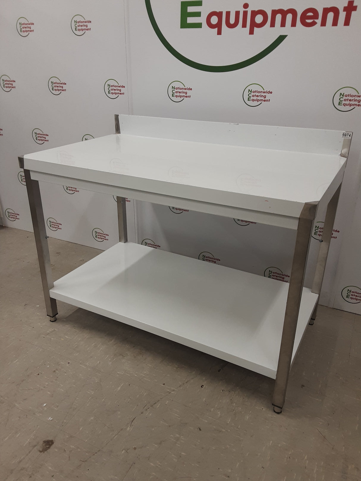 New/Un-Used Stainless Steel 120x70cmTable With Lower Shelf & Upstand (NCE5974)