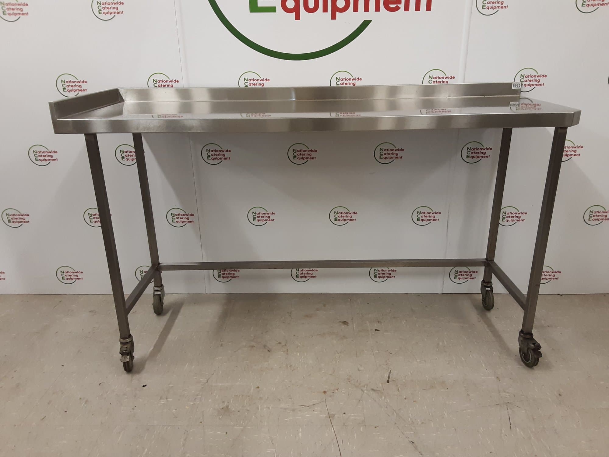 Stainless Steel Table On Wheels With Appliance Space 180x60cm — image 1