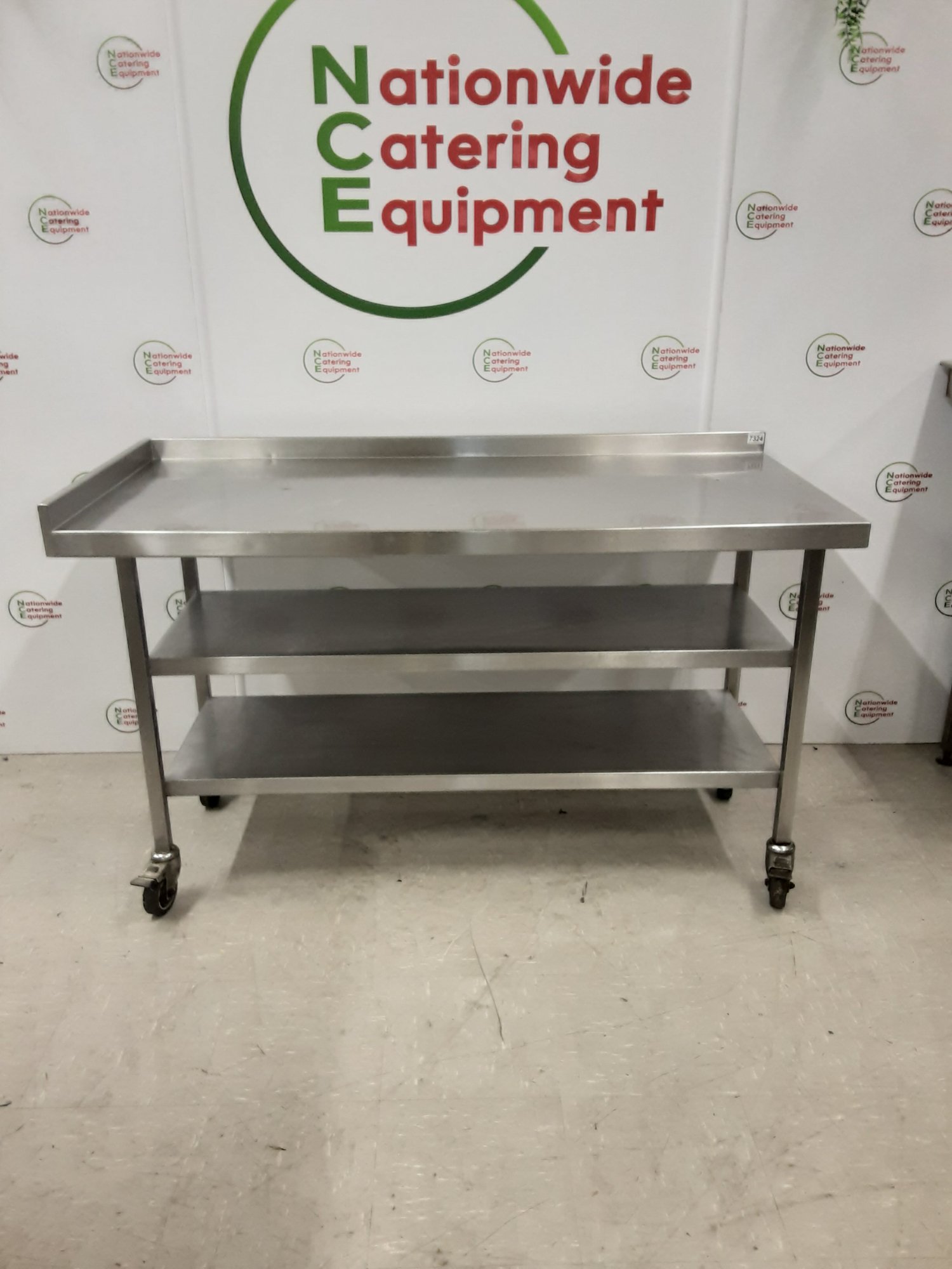 Stainless Steel Table On Wheels With Two Lower Shelves 150x70cm — image 1
