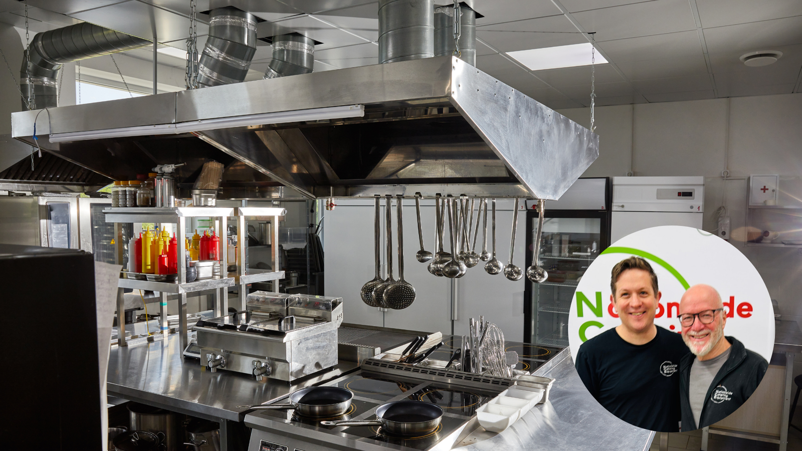 Commercial catering equipment in a stainless steel kitchen, showing cooking range, ventilation, and fridges — Nationwide Catering maintenance guide.