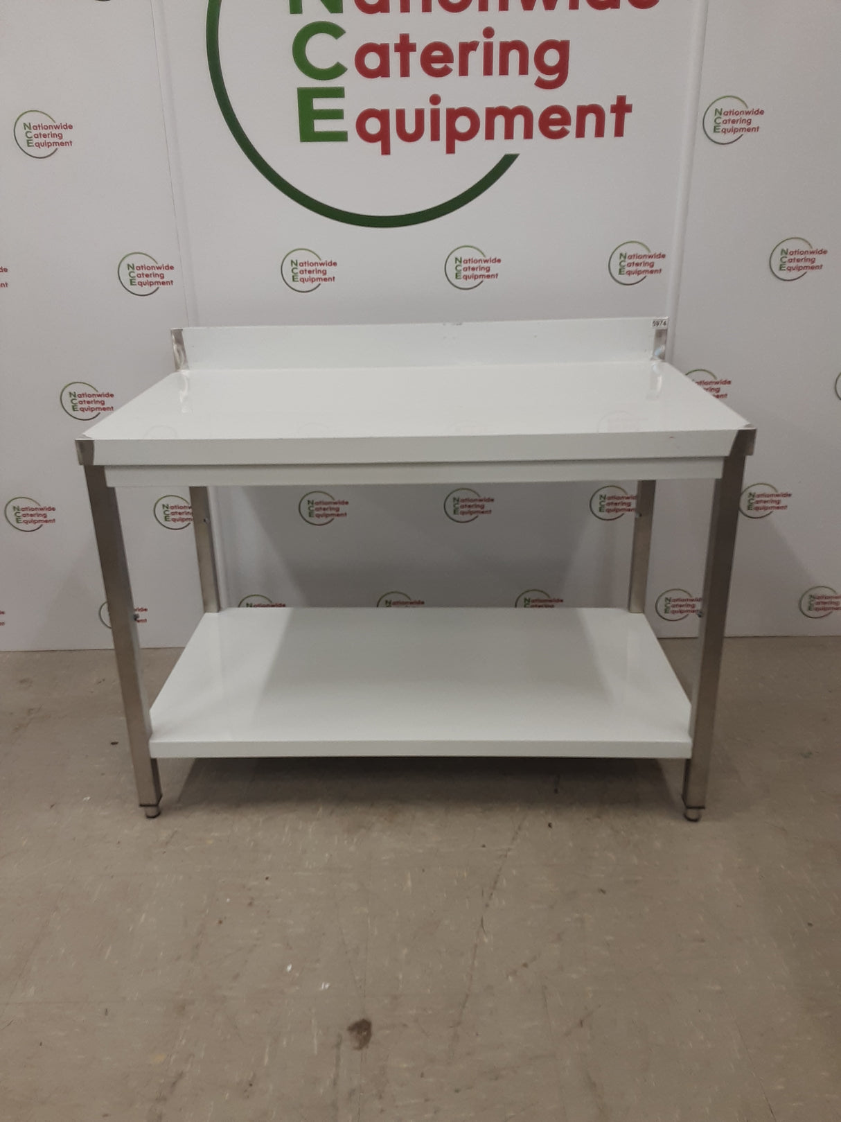 New/Un-Used Stainless Steel  120x70cmTable With Lower Shelf & Upstand (NCE5974)