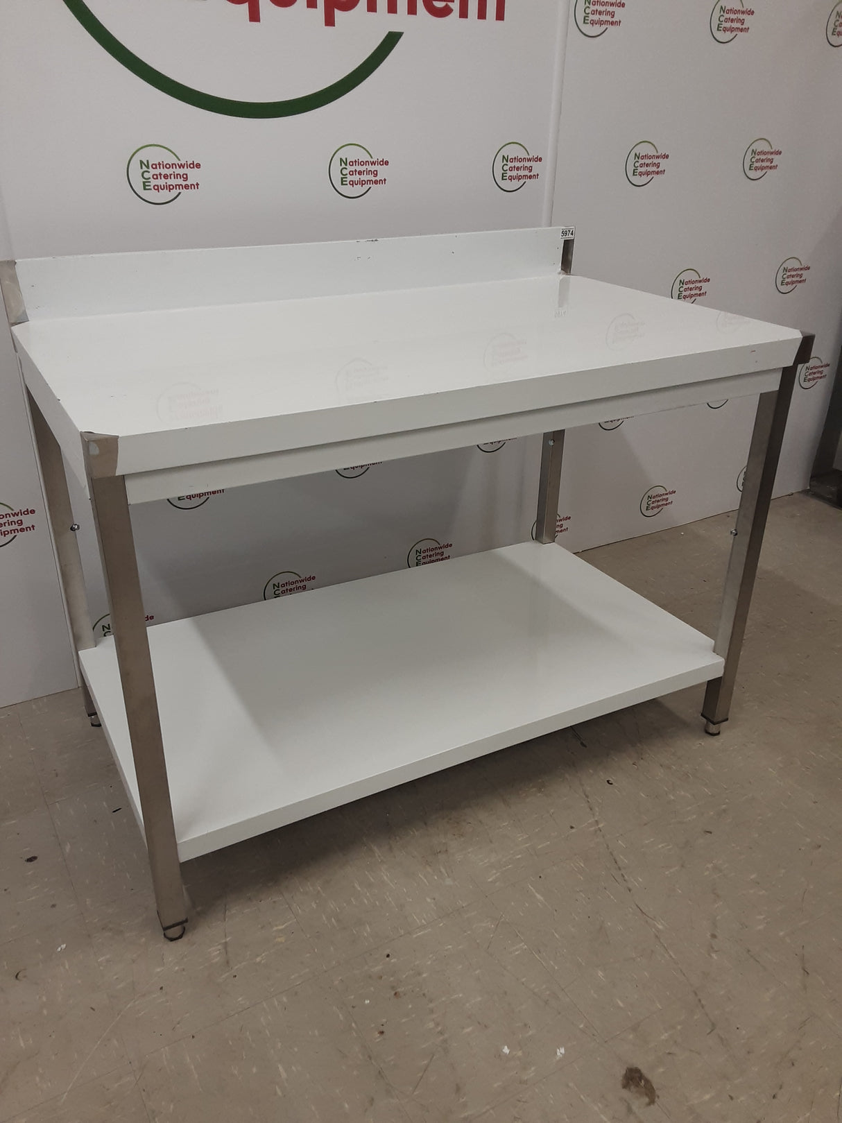New/Un-Used Stainless Steel  120x70cmTable With Lower Shelf & Upstand (NCE5974)