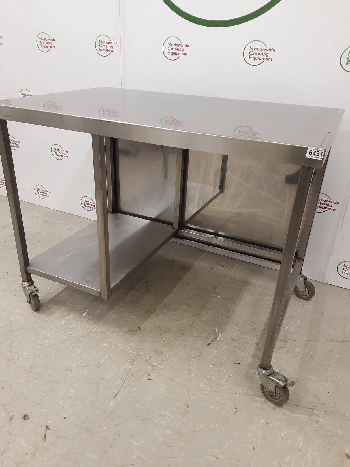 Stainless Steel Table On Wheels With Appliance Space 115x75cm (NCE6431)