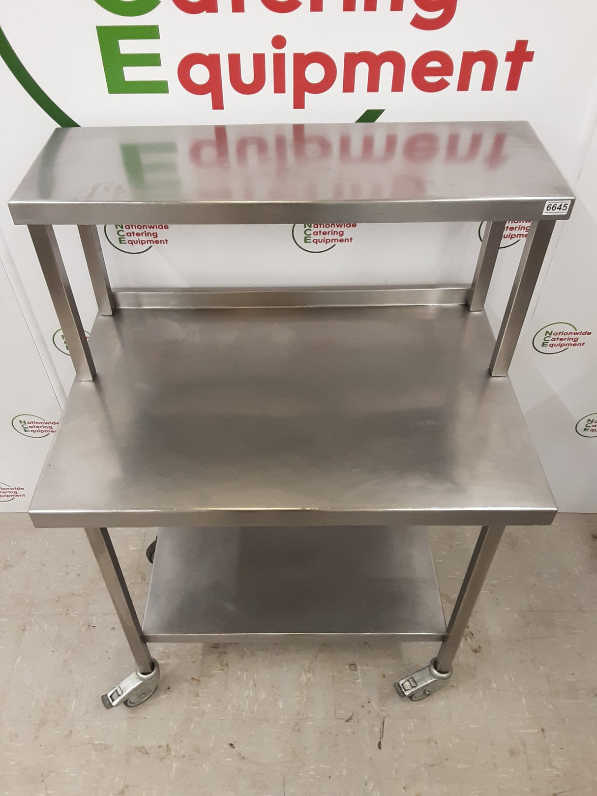 Stainless Steel Table On Wheels With Shelf Above (NCE6645)